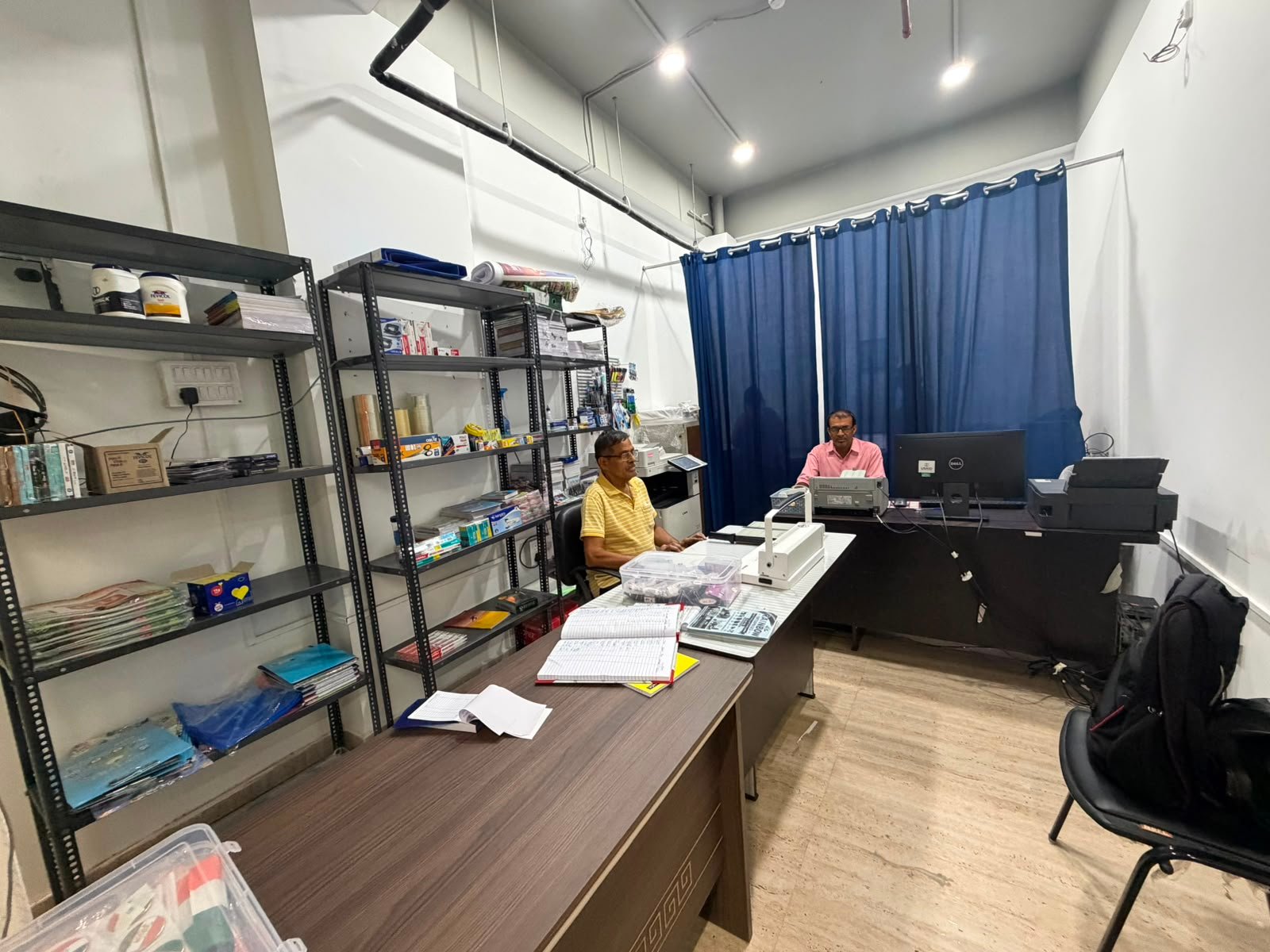 Heavy-duty production printing floor and computer counter inside Shop 79 KB Mart Knowledge Park II