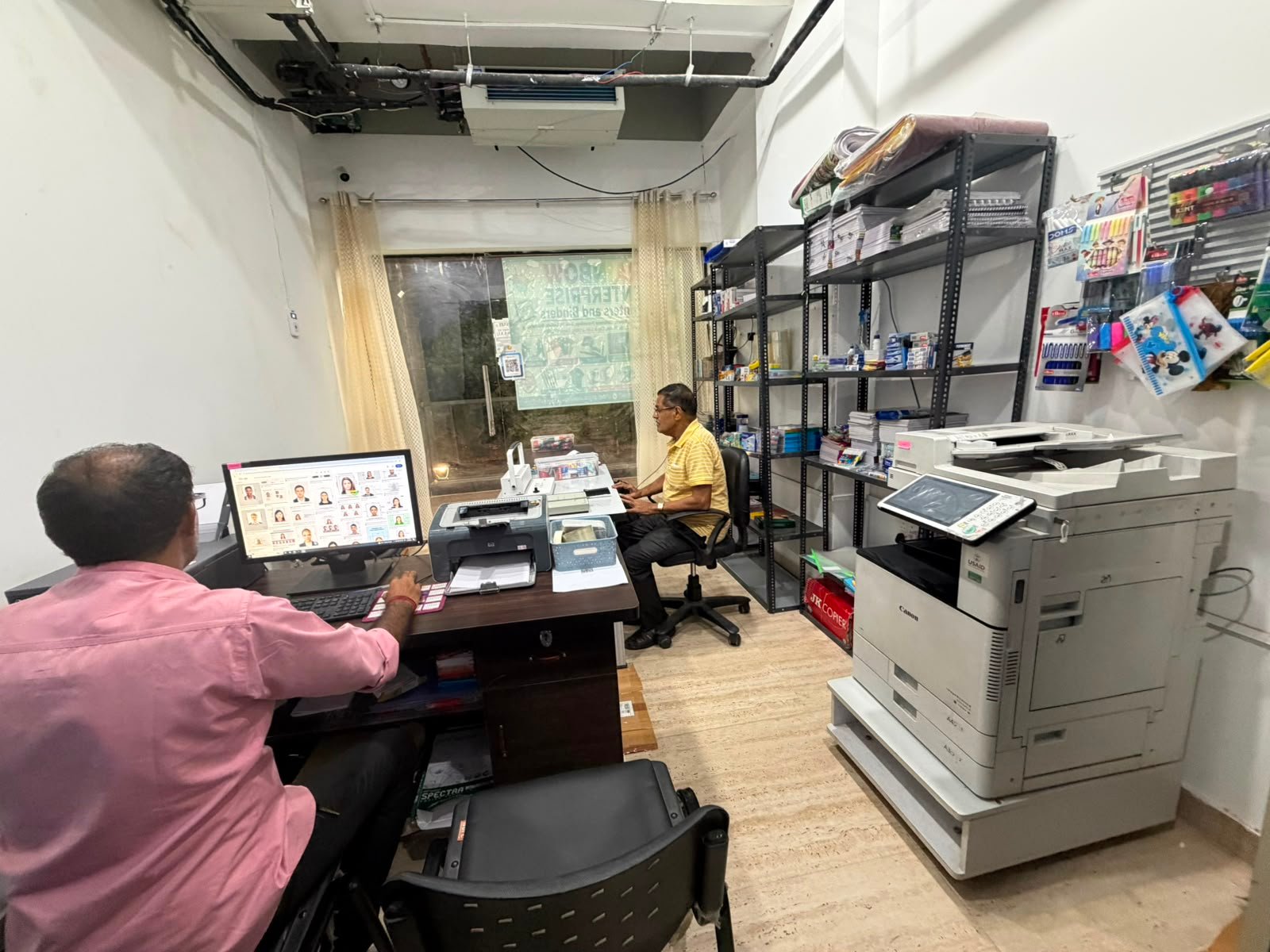 Canon multi-tray digital presses and binding finishing station at Rainbow Enterprise